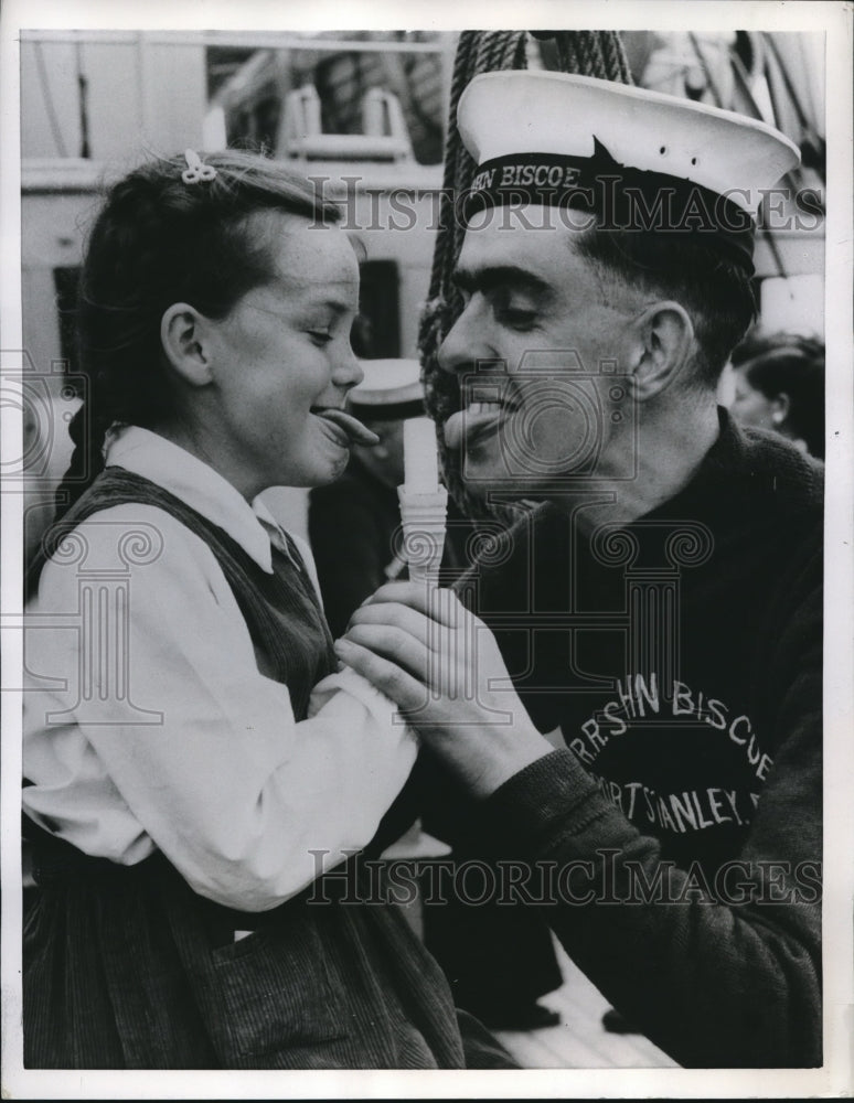 Load image into Gallery viewer, 1956 Press Photo Seaman David Miller &amp; his sister 10-year-old Pauline
