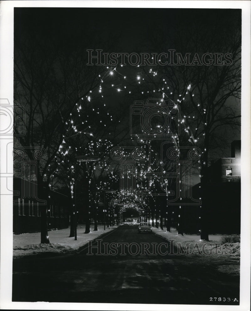 Load image into Gallery viewer, 1956 Press Photo Street filled with lights
