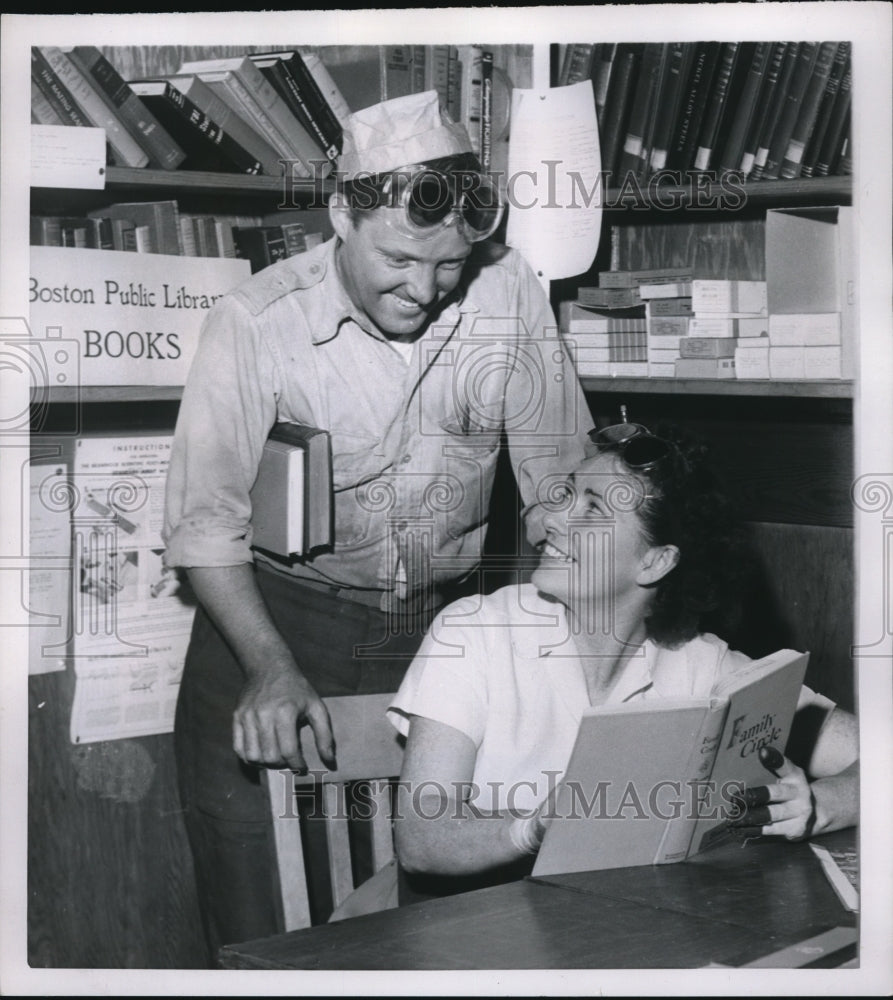 1953 Press Photo Boston Mass Helen Welsh & George Moore reading at book room