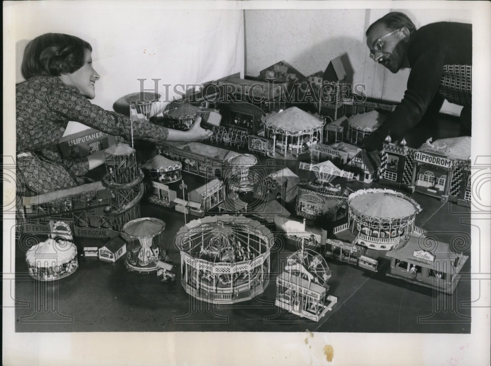 1956 Press Photo Brigitte Wohlmann and father, Eduardo set up mini Oktoberwiesn