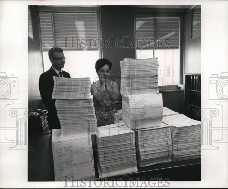 Load image into Gallery viewer, 1955 Press Photo Tax rebate forms, Carol Walters sec at Ford Motor Co
