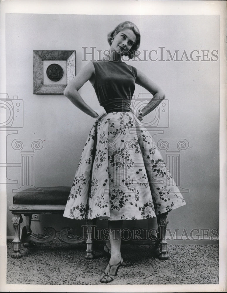 Load image into Gallery viewer, 1956 Press Photo Mink-colored velveteen camisole top &amp; floral cotton satin skirt
