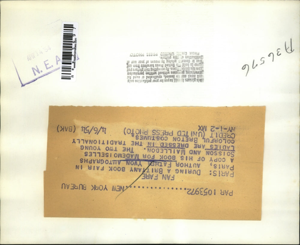 1954 Press Photo Paris Author Father Tvon signs book for Soiion, Mailleson