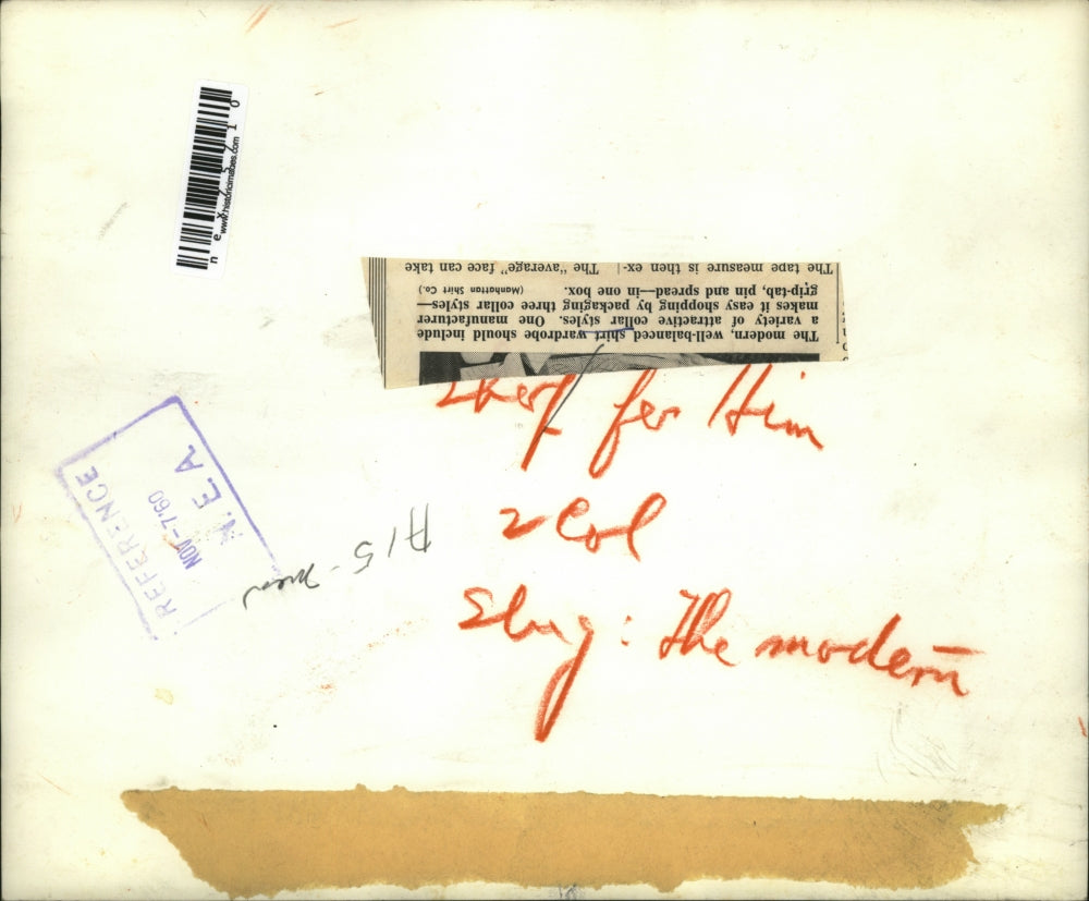 1960 Press Photo A man & woman look at shirts of his well balanced wardrobe