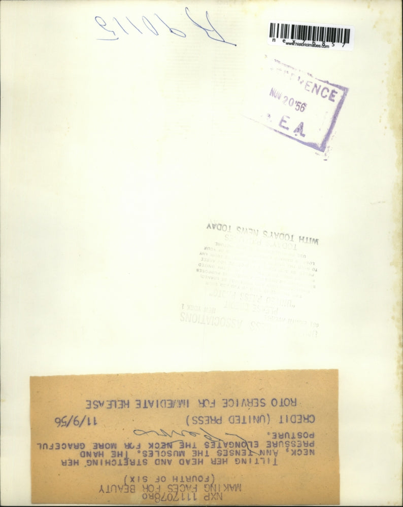 1956 Press Photo Tilting her head & stretching her neck Ann tenses muscles