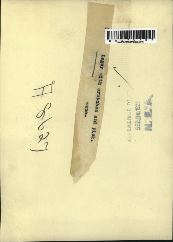 1927 Press Photo Mr Leger on crutches with a pick axe