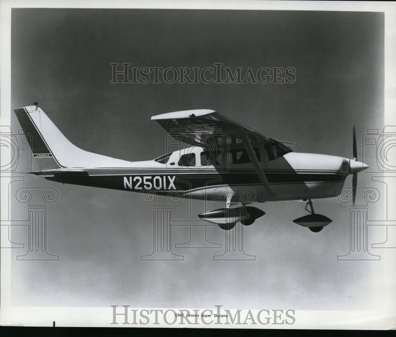 Load image into Gallery viewer, 1965 Press Photo A Cessna Super Skylane plane in flight
