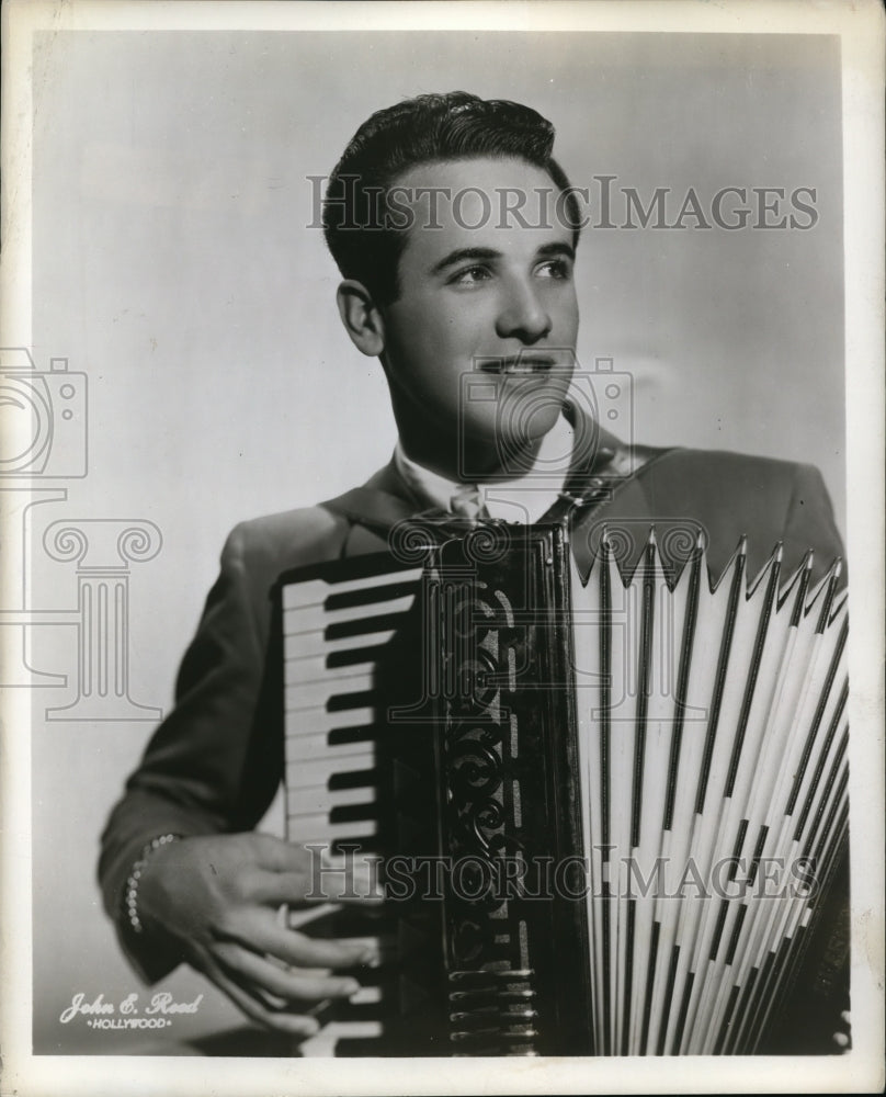 1948 Press Photo Dick Contino playing accordian for RKO