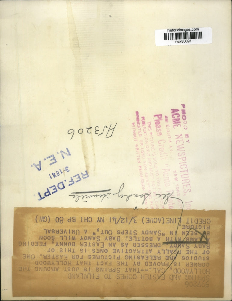 1941 Press Photo Baby Sandy Dressed as Bunny Feeding Lamb on Sandy Steps Out