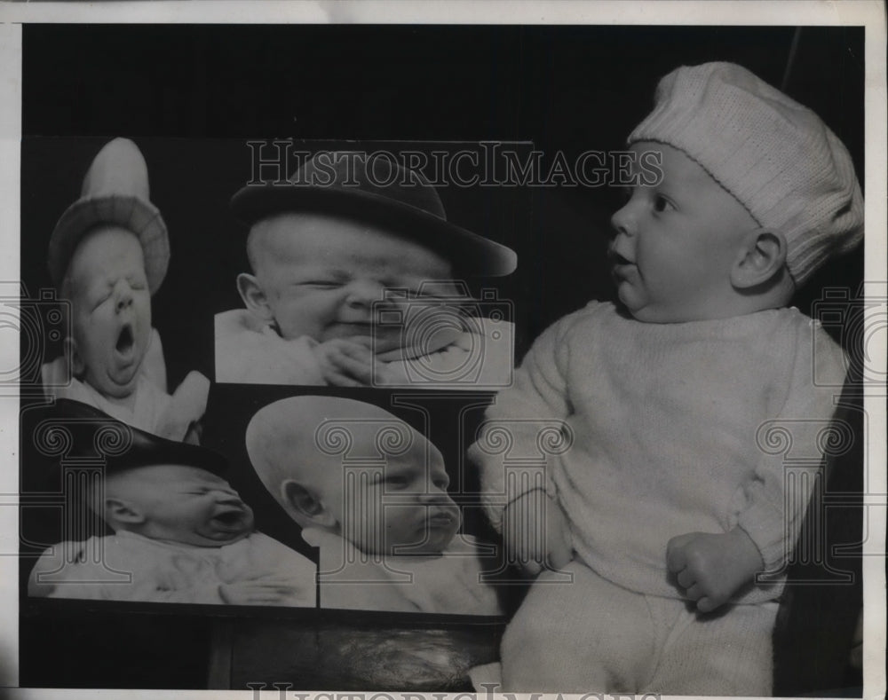 1933 Press Photo Richard Allen Klein Looking at Pictures of Himself
