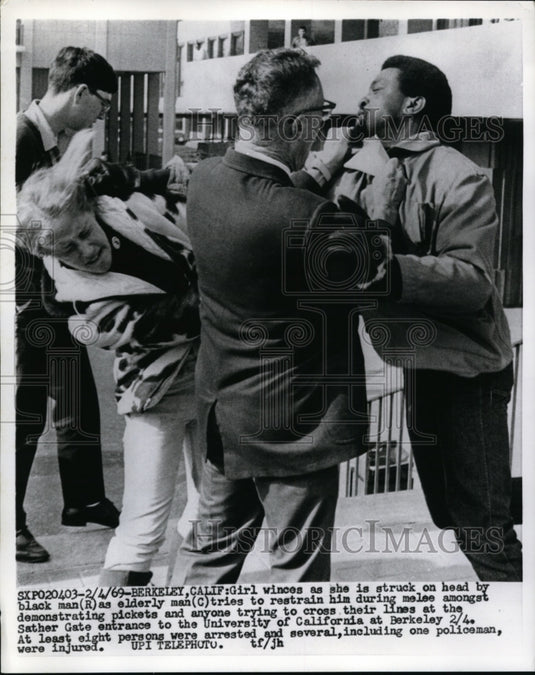 1969 Press Photo Woman Struck By Black Man at University of California