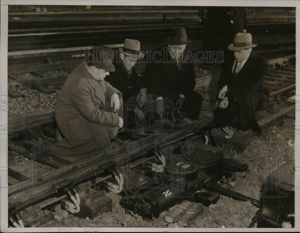 1937 Press Photo A de-icer switch on rr tracks, AC Carlan, HC Peterson train mas