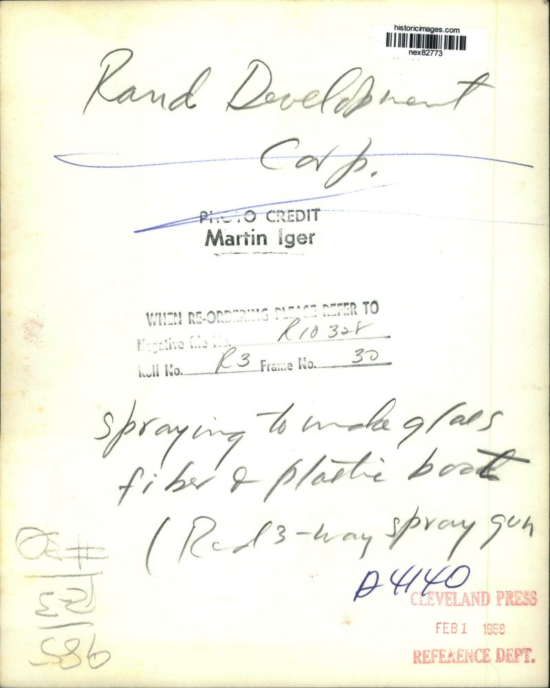 1958 Press Photo Rand Development Corp men work on aplastic boat