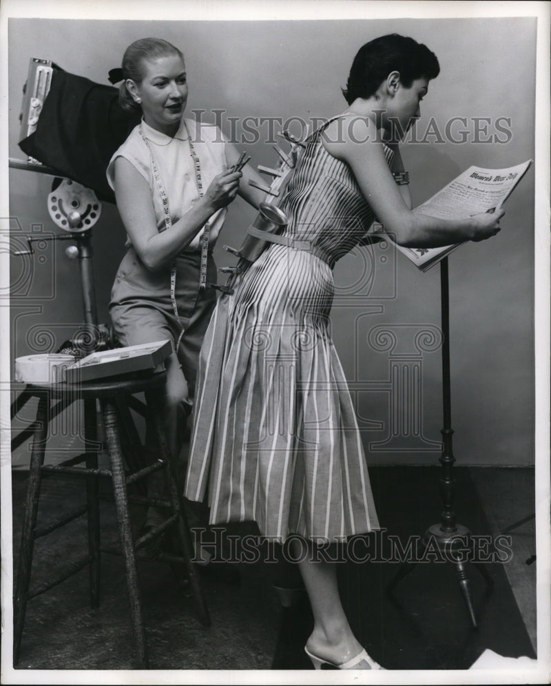 Load image into Gallery viewer, 1956 Press Photo Rita Hackett glamor dress &amp; a model sewn into it - nex84852

