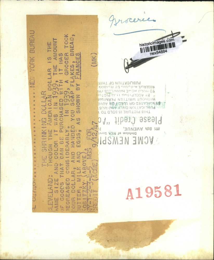 1947 Press Photo Cleveland Frances Kositzky at grocers with milk, butter & soap