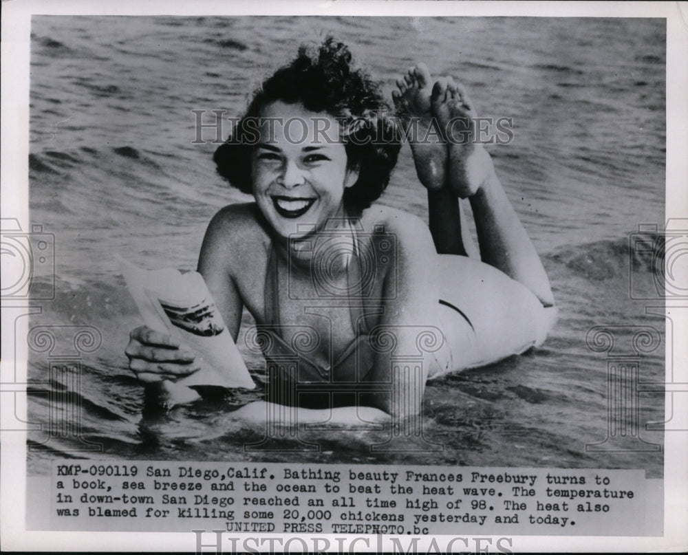 1955 Press Photo San Diego Calif Frances Freebury relaxes at beach in heatwave