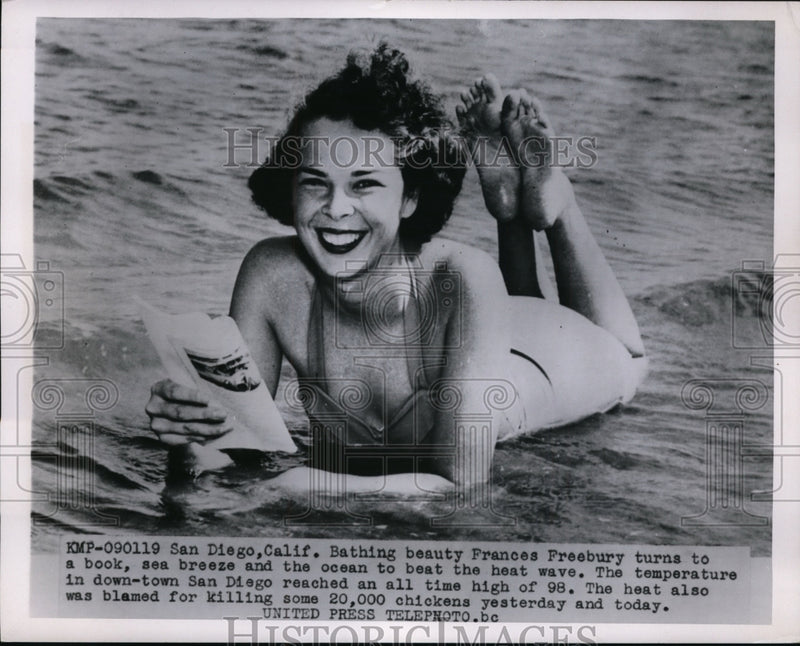 Load image into Gallery viewer, 1955 Press Photo San Diego Calif Frances Freebury relaxes at beach in heatwave
