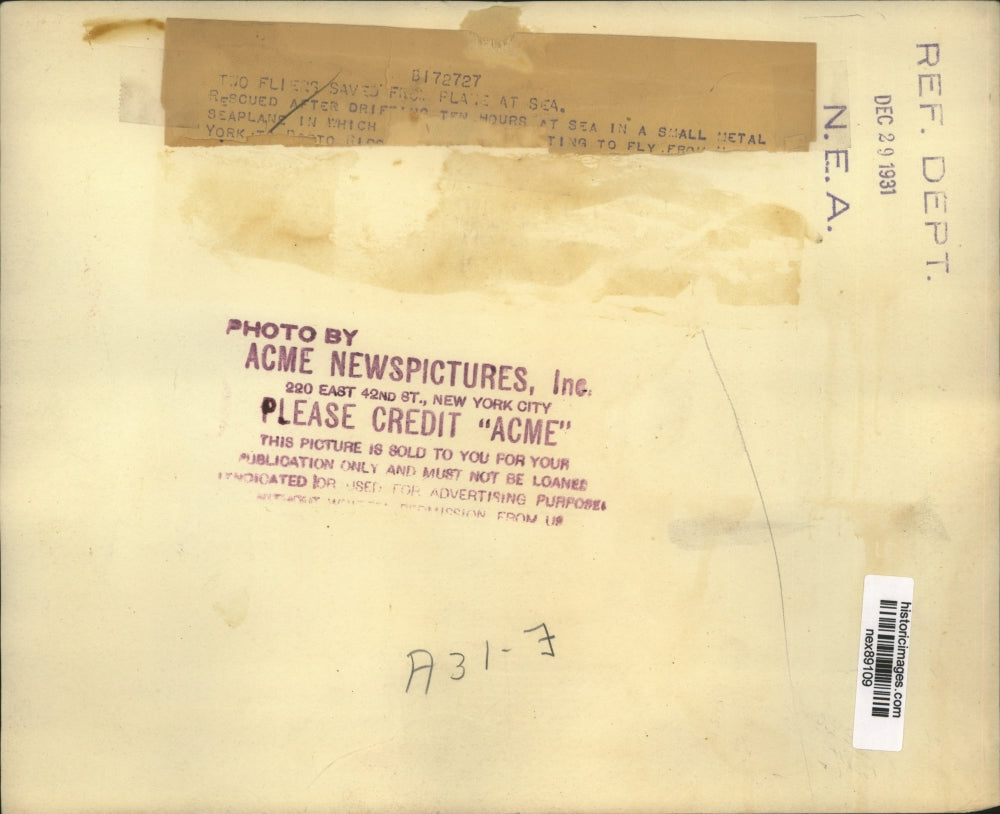 1931 Press Photo Two Pilots Rescued by Ship From Drifting Metal Seaplane