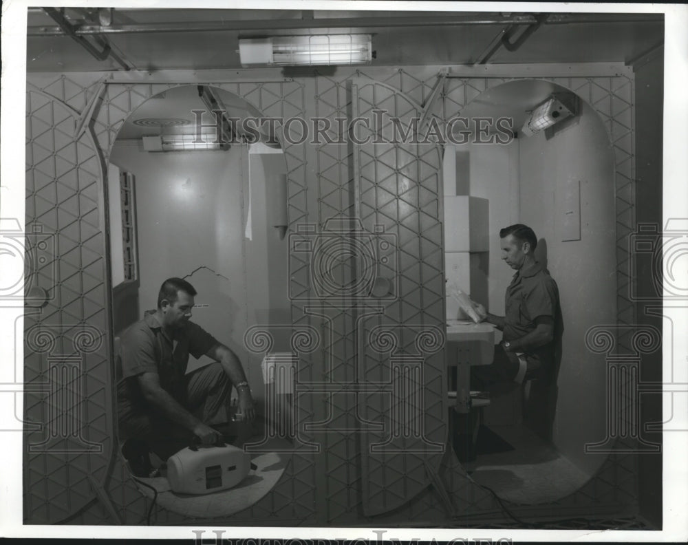 1969 Press Photo Checking Out Equipment Wast Management & Food for Saturn V