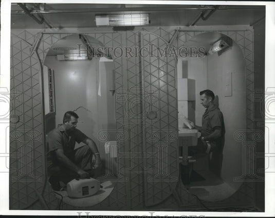 1969 Press Photo Checking Out Equipment Wast Management & Food for Saturn V