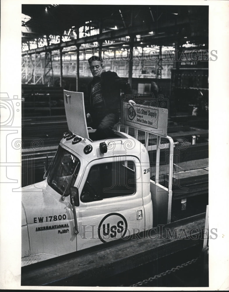 Load image into Gallery viewer, 1962 Press Photo Truck Driver Ed Harrold Comes Out Door On Top Of Cab of Truck
