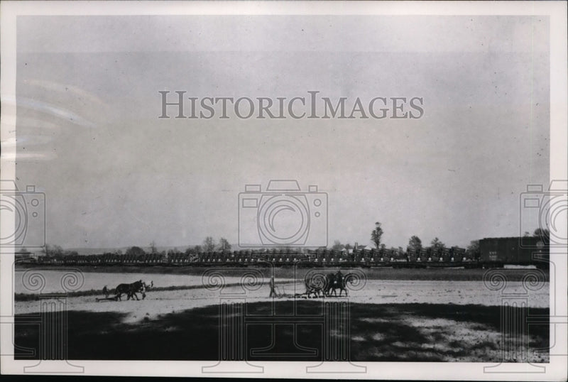 Load image into Gallery viewer, 1950 Press Photo Trainload of Mechanical Balers Leaving PA Passing Farmers
