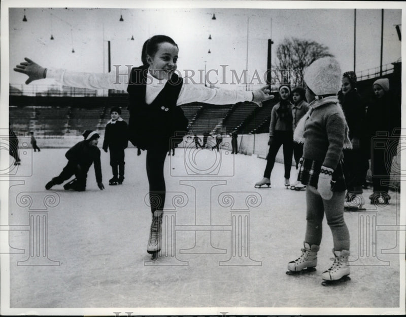 Load image into Gallery viewer, 1961 Press Photo Christian Carlson &amp; Lotta Levison Skating in Stockholm Sweden
