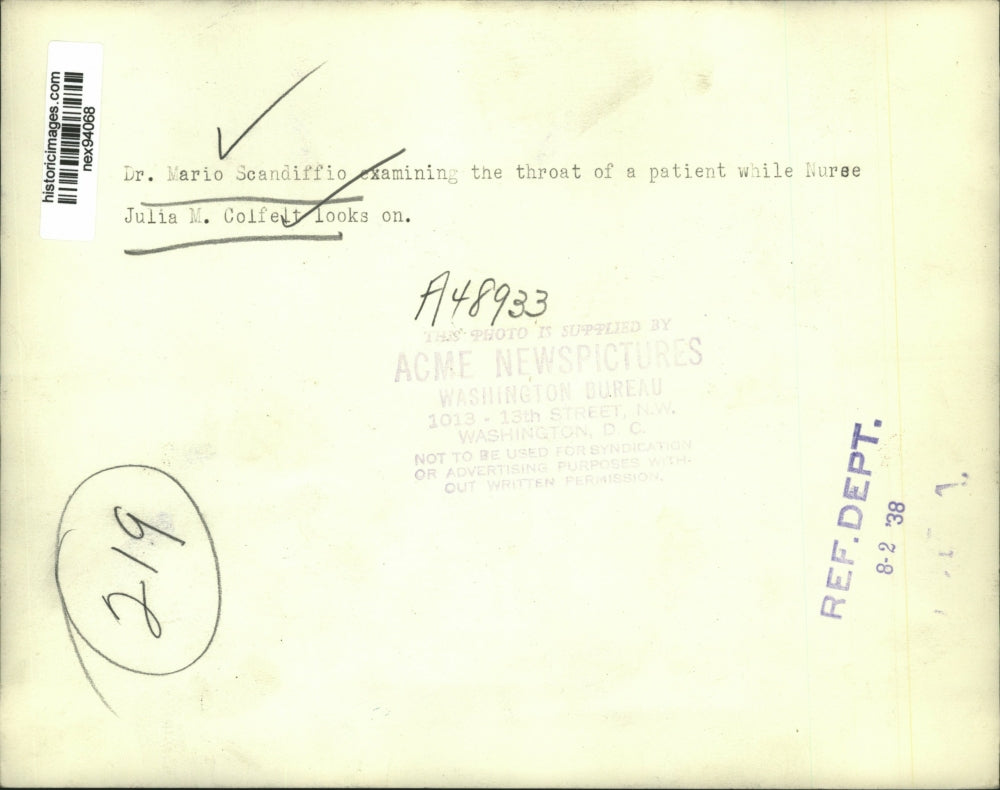 1938 Press Photo Dr Mario Scandiffio Examining Patient Julia Colfelt Watches