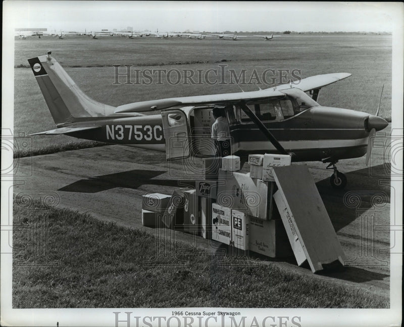 Load image into Gallery viewer, 1955 Press Photo Cessna Plane Being Loaded with Packages - nex95880
