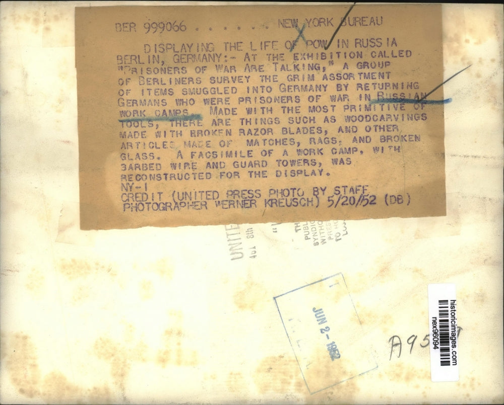 1952 Press Photo Exhibition of Group of Berliners with Items Russian War Camps