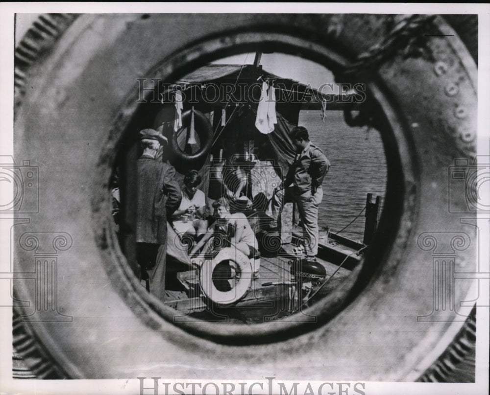 1951 Press Photo Crew of Raft Lettergia with Auto Tire Pier Bumper