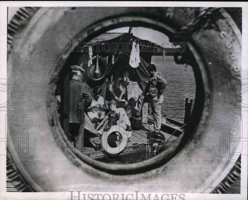 Load image into Gallery viewer, 1951 Press Photo Crew of Raft Lettergia with Auto Tire Pier Bumper
