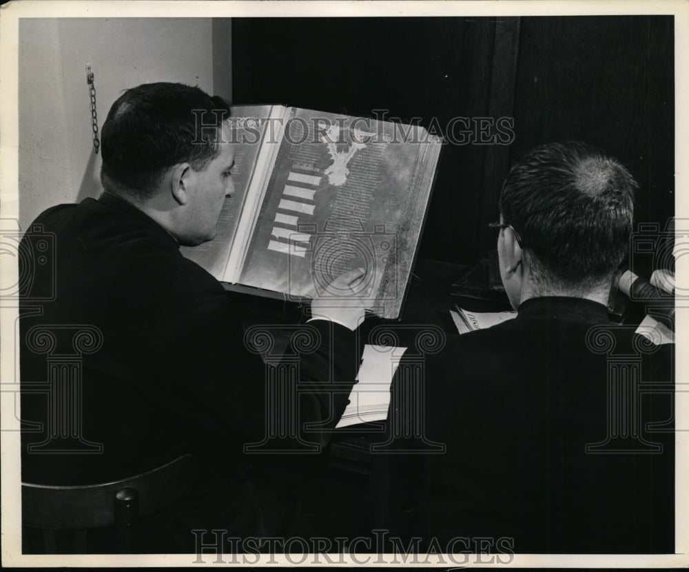 1948 Press Photo Ancient Edition of The Bible in Spanish & Andalusian Priest