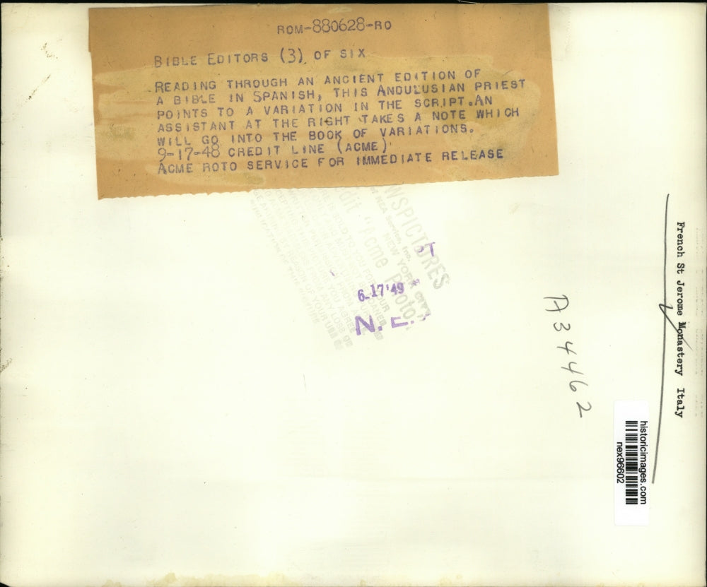 1948 Press Photo Ancient Edition of The Bible in Spanish & Andalusian Priest