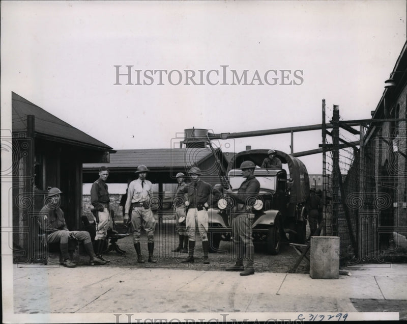 Load image into Gallery viewer, 1935 Press Photo Strike in Terre Haute Indiana Troopers Guard Plant Entrance
