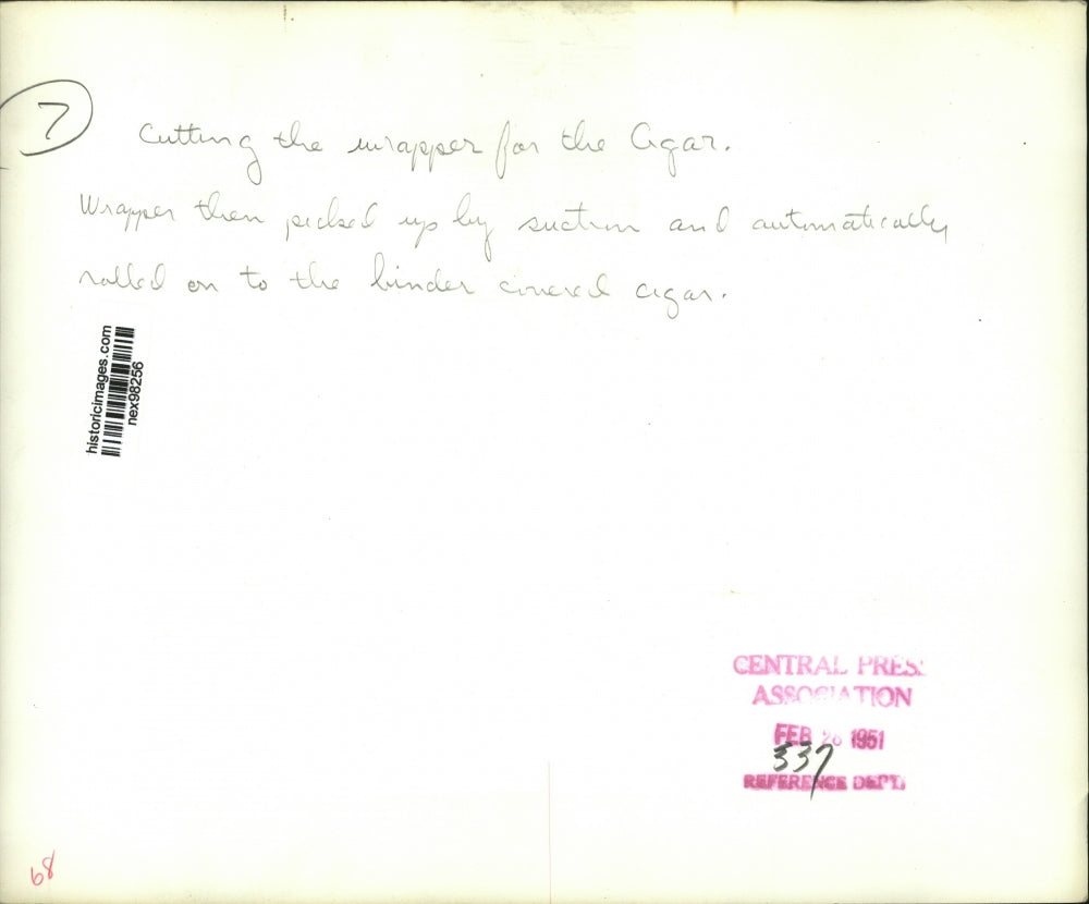 1951 Press Photo Machine Cuts Wrapper for The Cigar