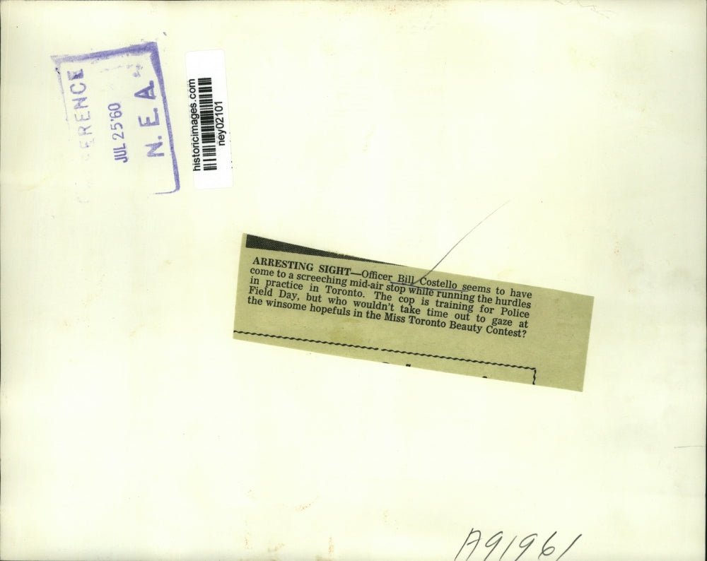 1960 Press Photo Officer Bill Costello Running Hurdles Police Field Day & Beauty