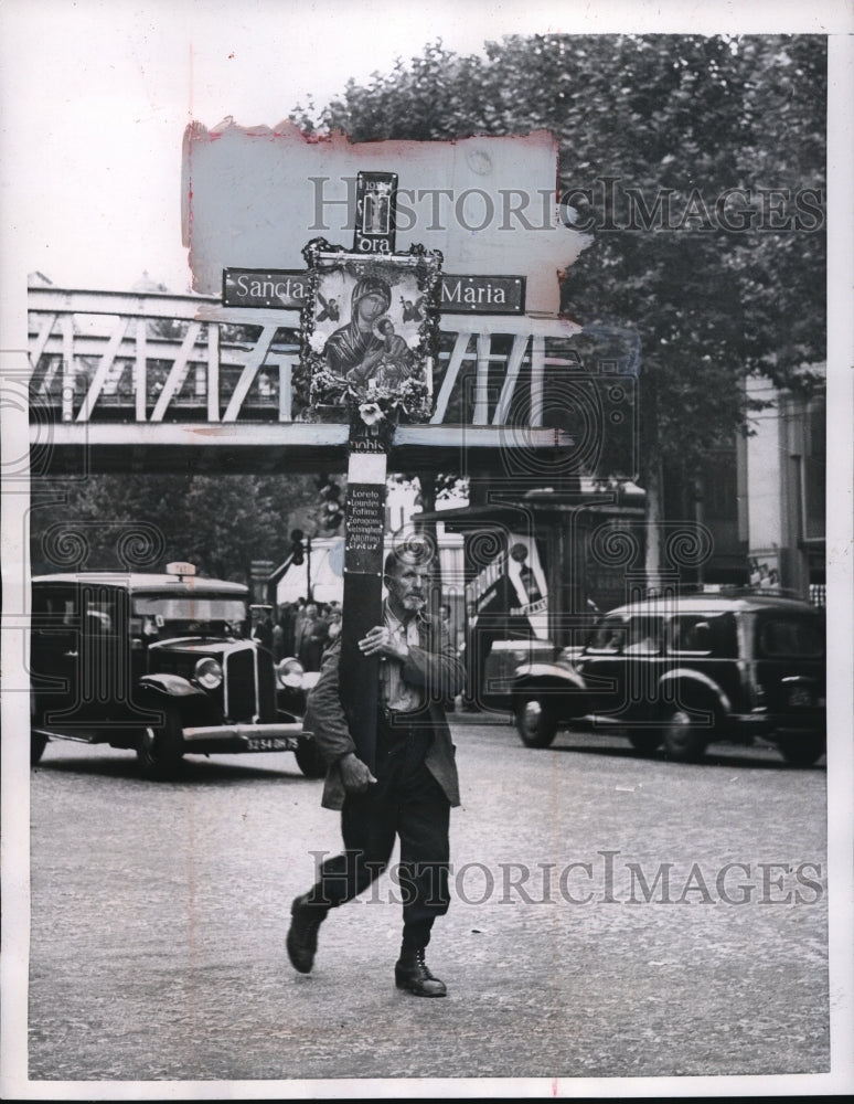 Load image into Gallery viewer, 1955 Press Photo Carries Cross with Names of Previous Pilgrimages in Paris
