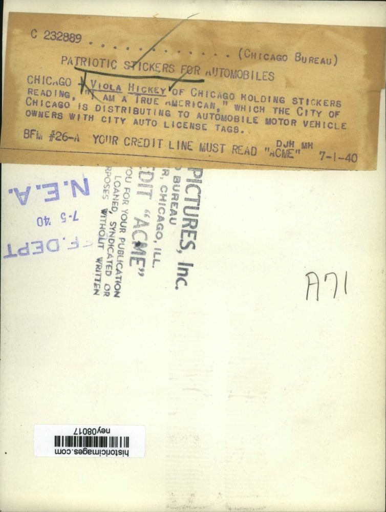 1940 Press Photo Viola Hickey Holding Patriotic Stickers - ney08017