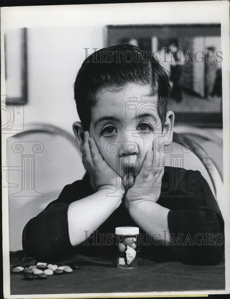 Load image into Gallery viewer, 1968 Press Photo Boy Douglas Shaw Frustrated Over Child-Proof Medicine Bottle
