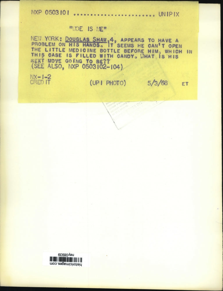 Load image into Gallery viewer, 1968 Press Photo Boy Douglas Shaw Frustrated Over Child-Proof Medicine Bottle
