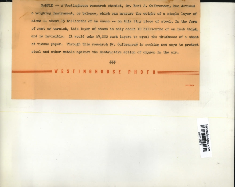 Press Photo Tiny Weighing Instrument by Dr. Earl A. Gulbransen - ney12079