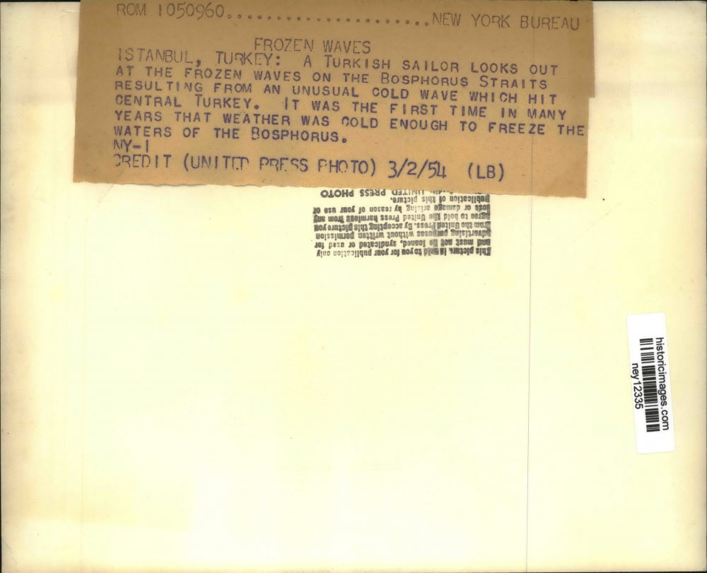 1954 Press Photo Turkish Sailor Looking Out Over Frozen Waves, Bosphorus Straits