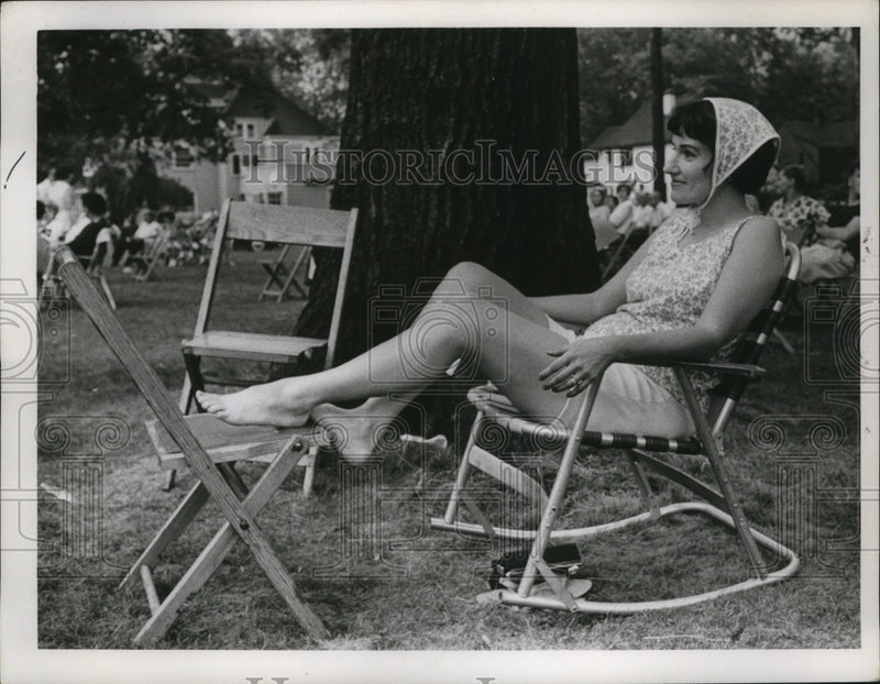 Load image into Gallery viewer, 1967 Press Photo Woman Lounges in Lakeland, Ohio Park - ney17685
