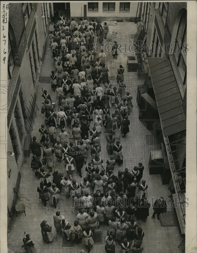 Load image into Gallery viewer, 1935 Press Photo Janitorial Workers Waiting to Enter Palatial German Bank
