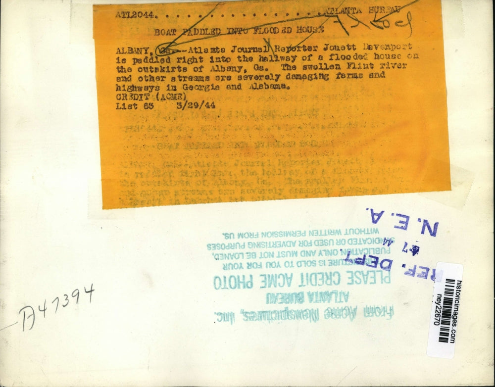 1944 Press Photo Atlanta reporter Jonett Davenport at scene of flooded home