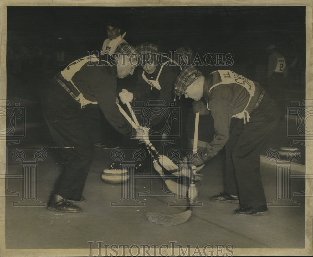 1957 Press Photo Swinney, Hill, Fletcher working the brooms - ney23032- Historic Images