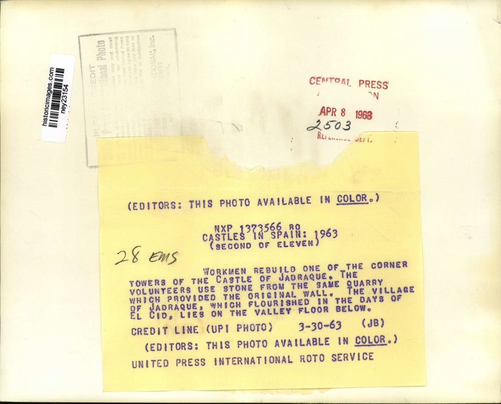 1963 Press Photo Workmen rebuild a corner tower of the Castle of Jadraque