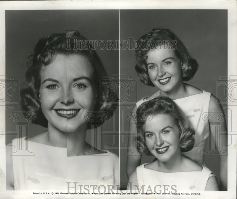 Load image into Gallery viewer, 1957 Press Photo Volkman twins match their best profiles with scissors and glue
