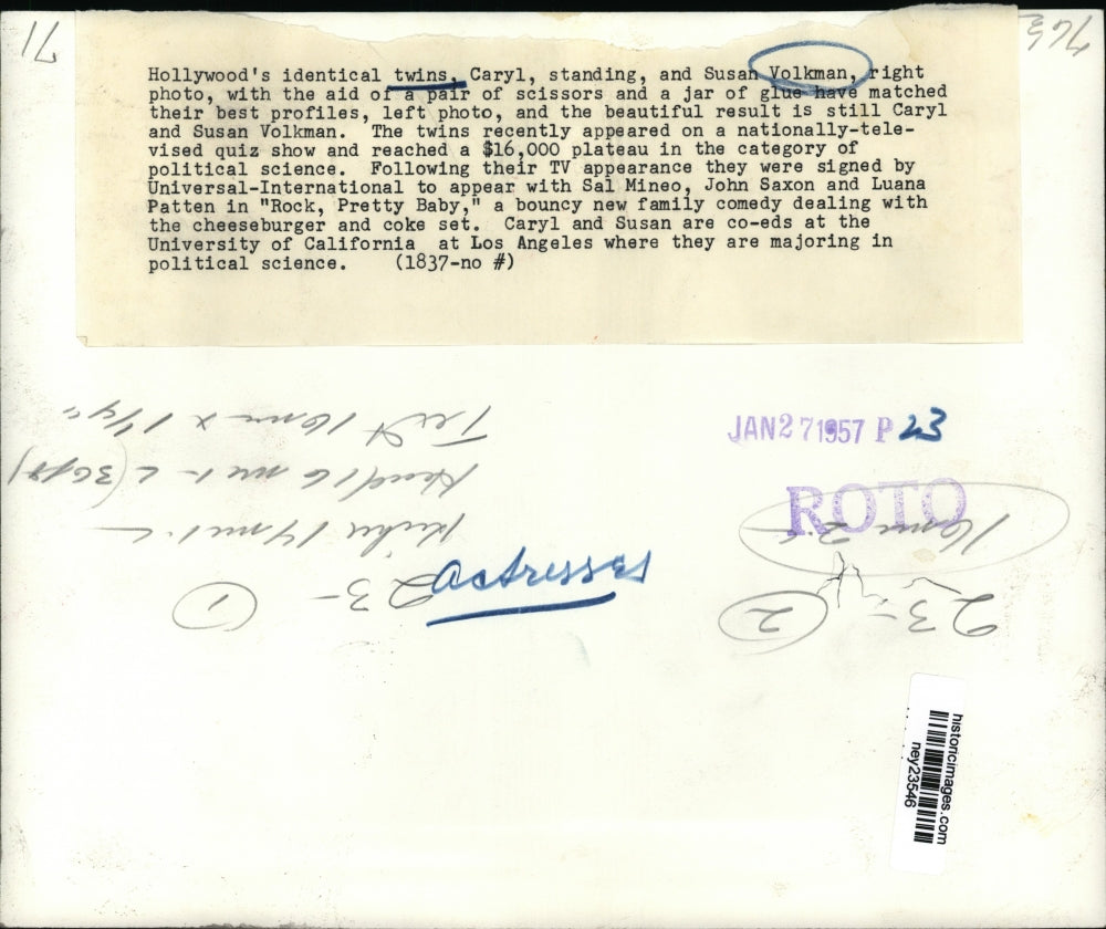 1957 Press Photo Volkman twins match their best profiles with scissors and glue